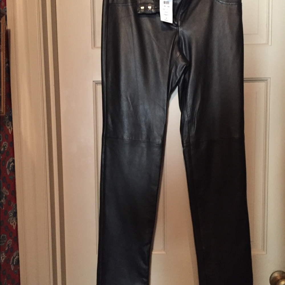 Black leather straight leg pants